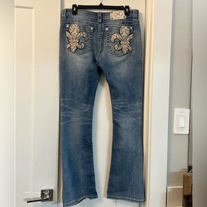 Miss Me faded bootcut jeans (30) with detailing on back pockets.